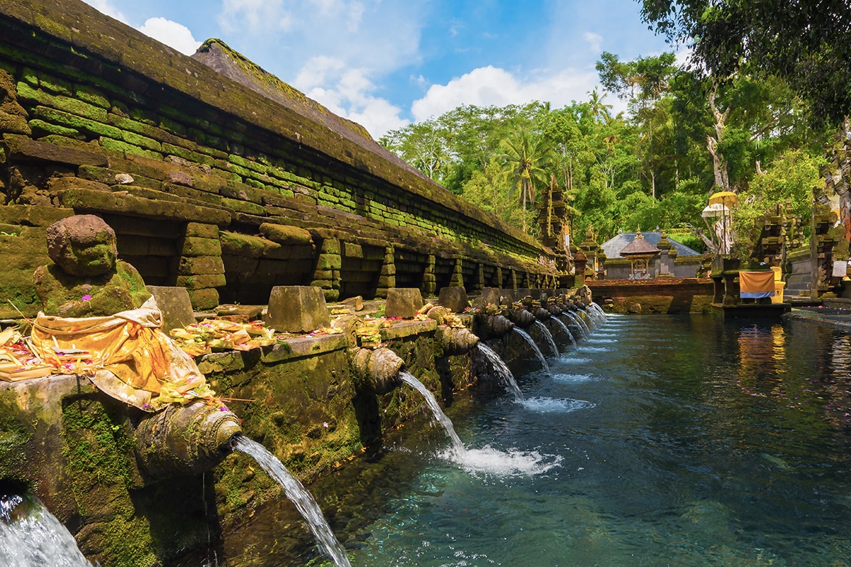 a pool of Pura Tirta Empul